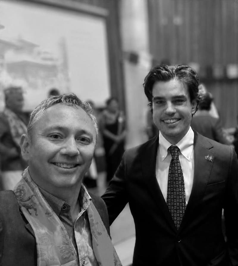 Black-and-white photo of David with Alexander Hillary at a formal event